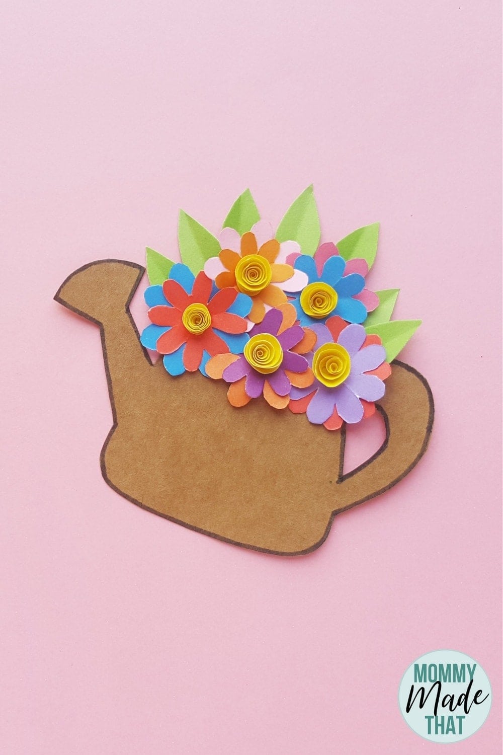 Adorable spring time kids craft. This fun and simple to make paper flower craft looks beautiful when finished. Comes with a free printable paper flower template you can download too!