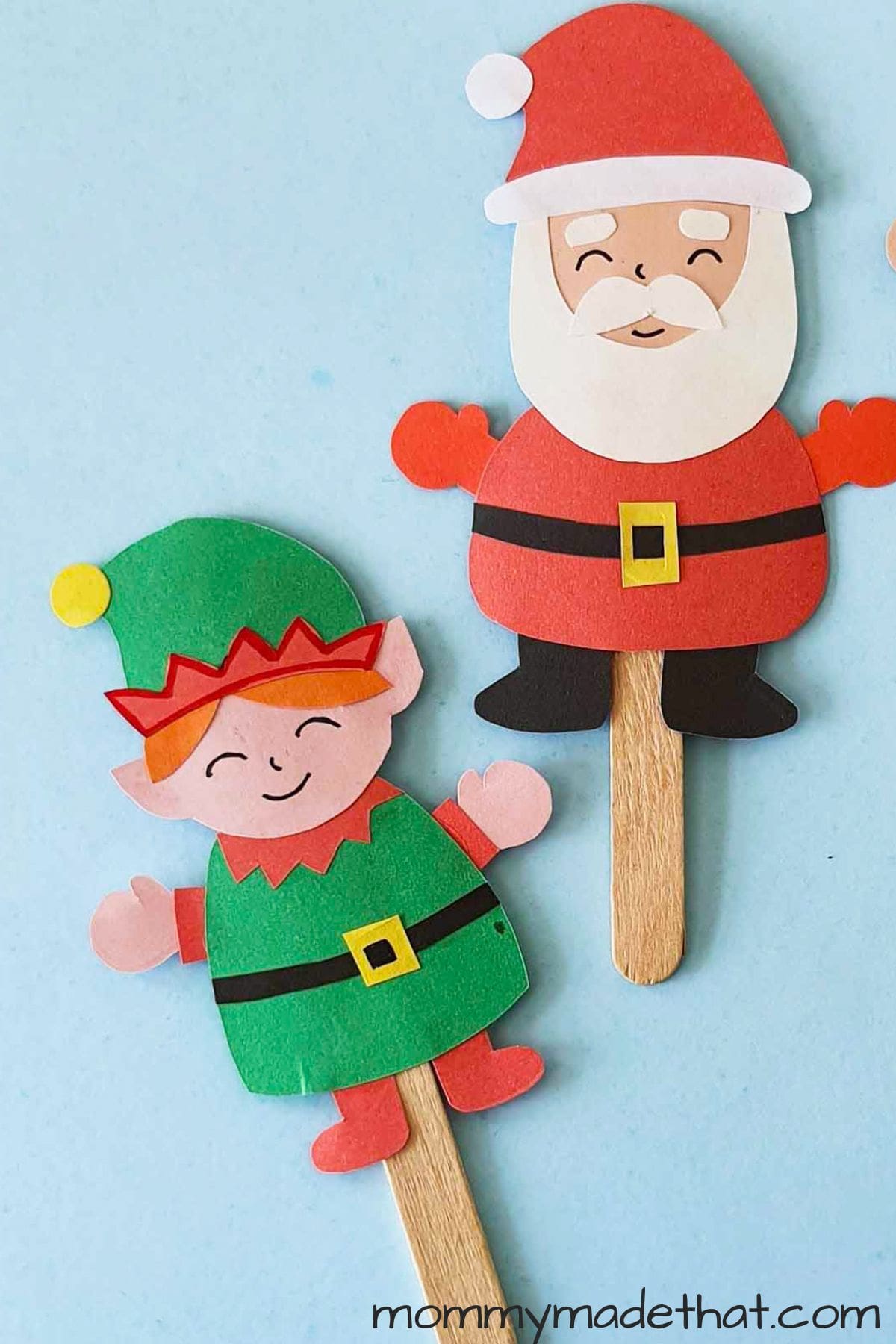 Cute elf and Santa Christmas puppets