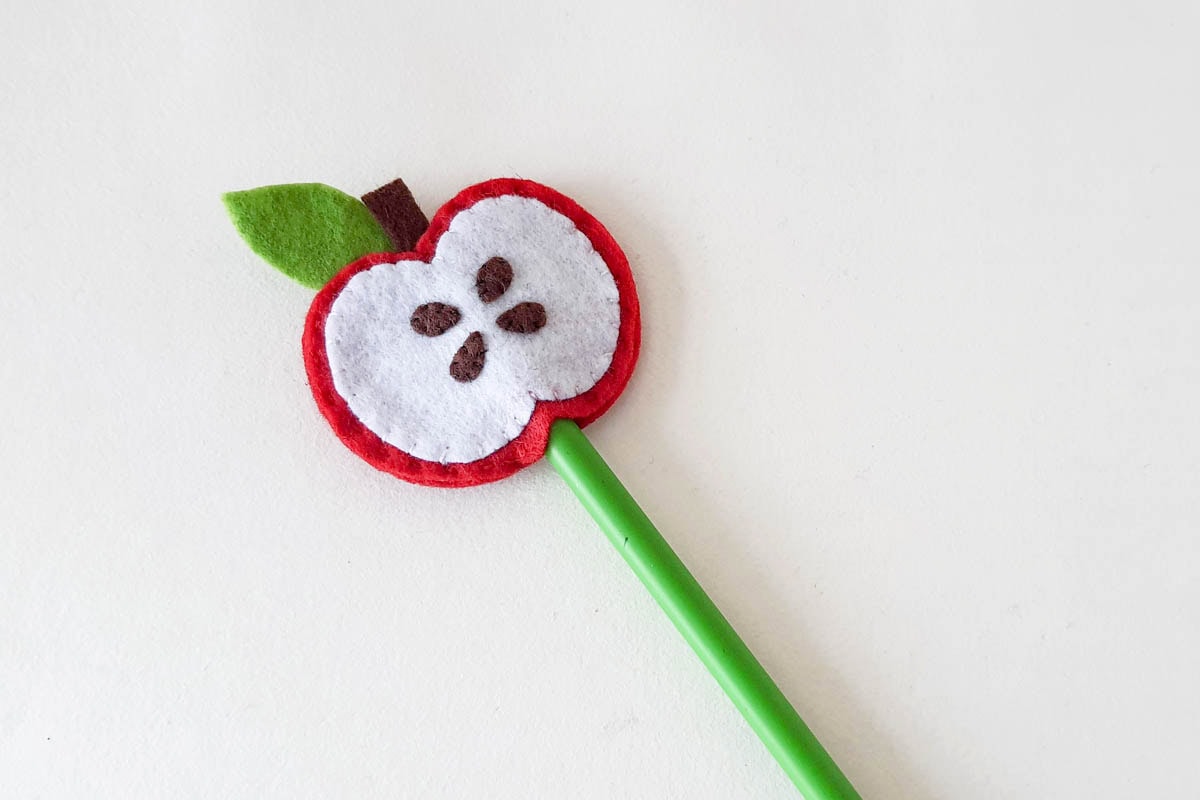 Felt apple pencil topper.