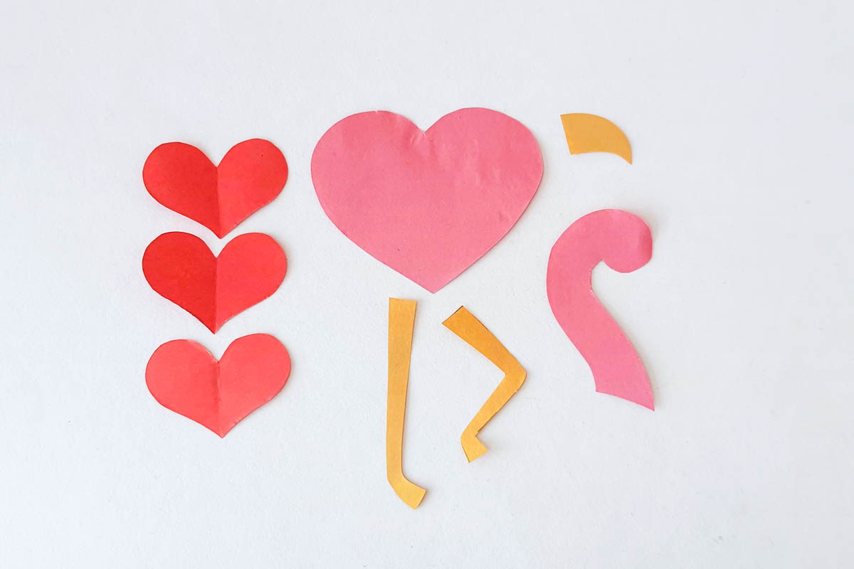 Heart flamingo craft template pieces cut out.