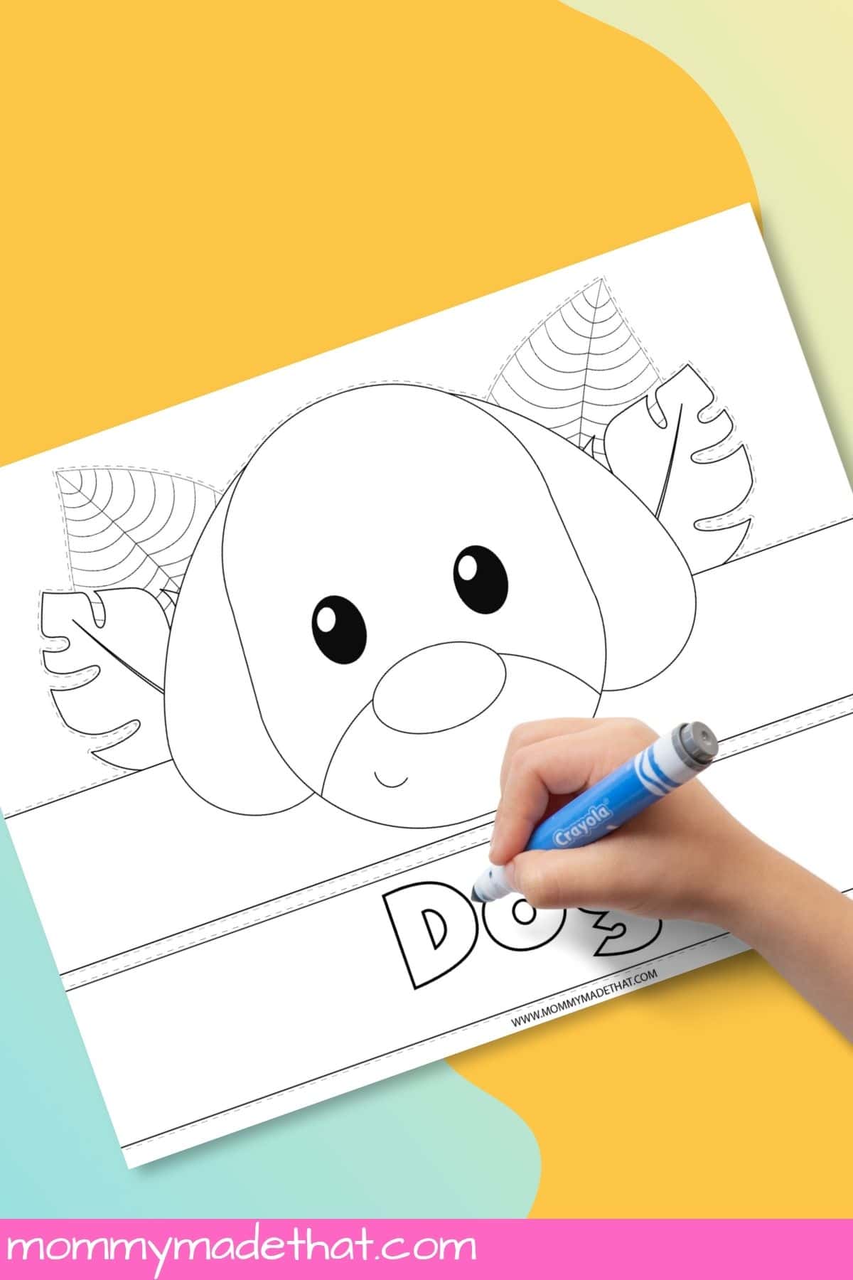 Child coloring the Dog lettering on a black-and-white puppy crown template