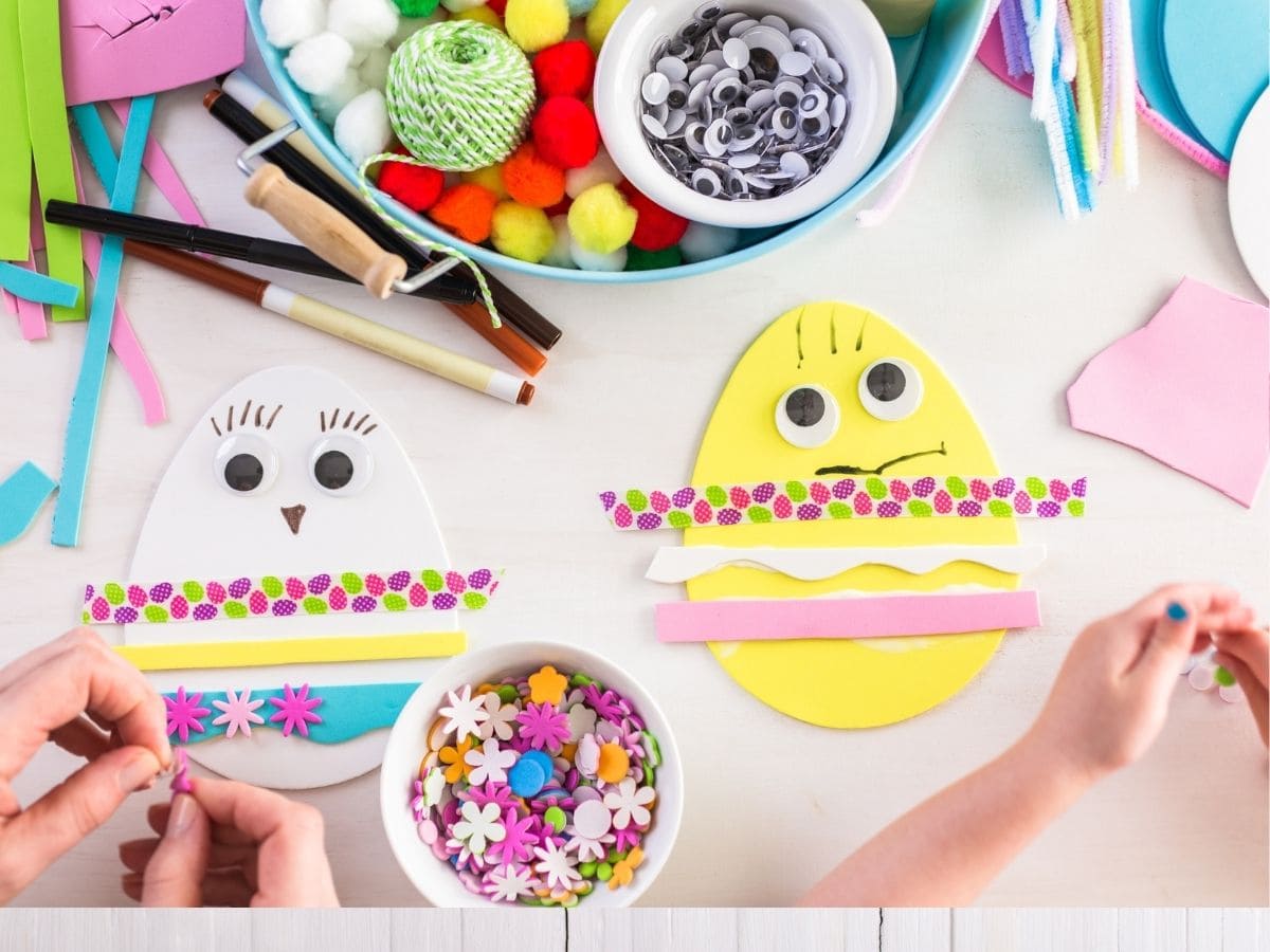 kids decorating Easter egg templates with felt, tape and pom poms