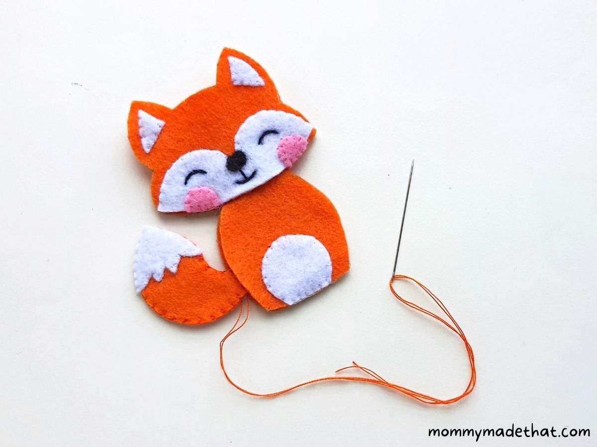 finishing up felt fox ornament