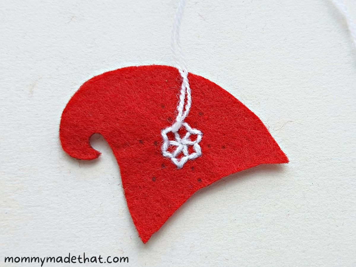stitching snowflake on gnome hat