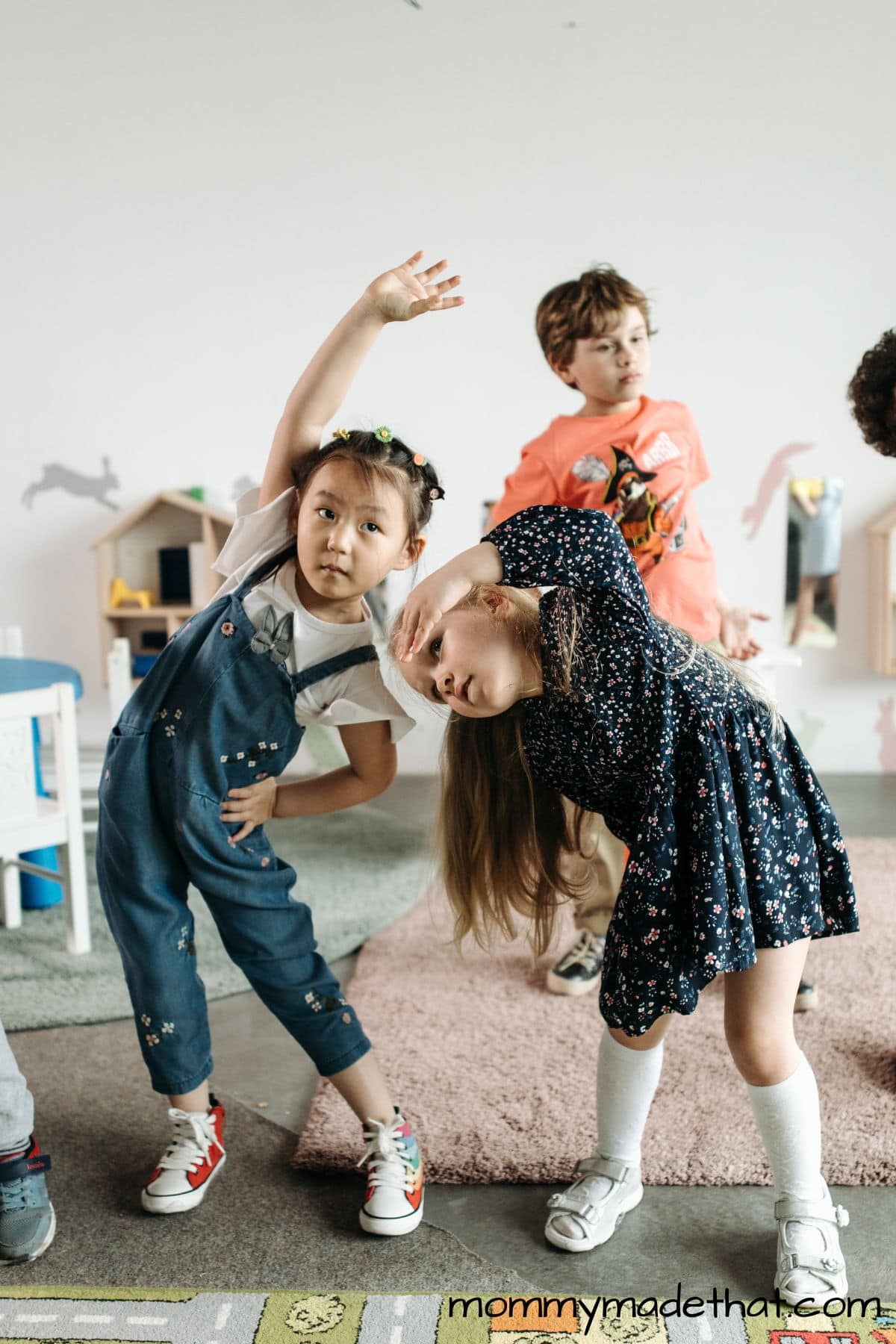 group of kids playing freeze dance.