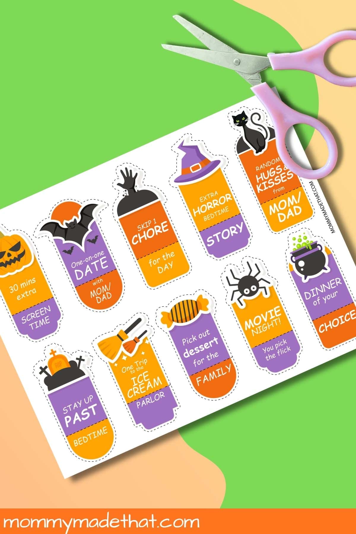 Halloween coupons for kids printed on a sheet beside pink scissors.
