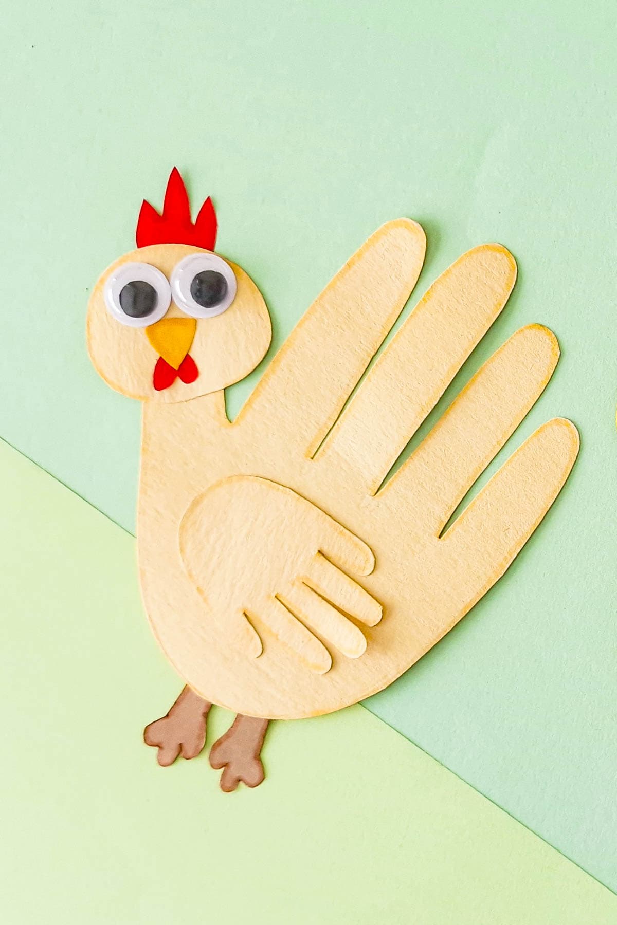 Handprint chicken craft.