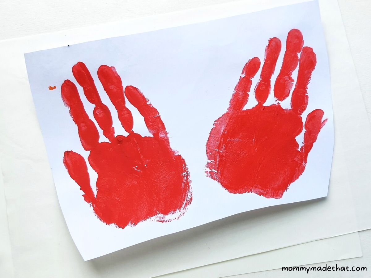 handprints painted on paper