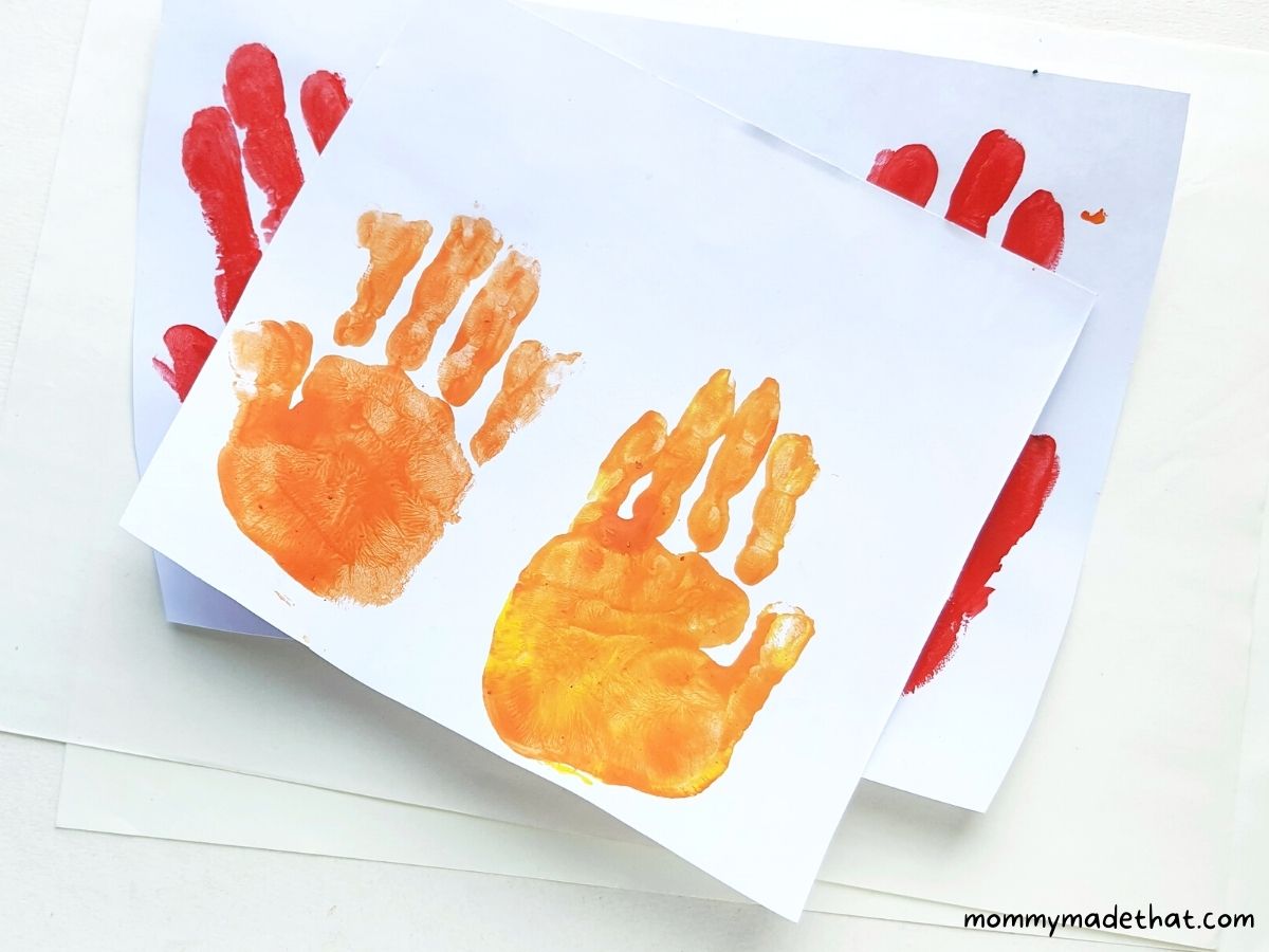 handprints painted on paper