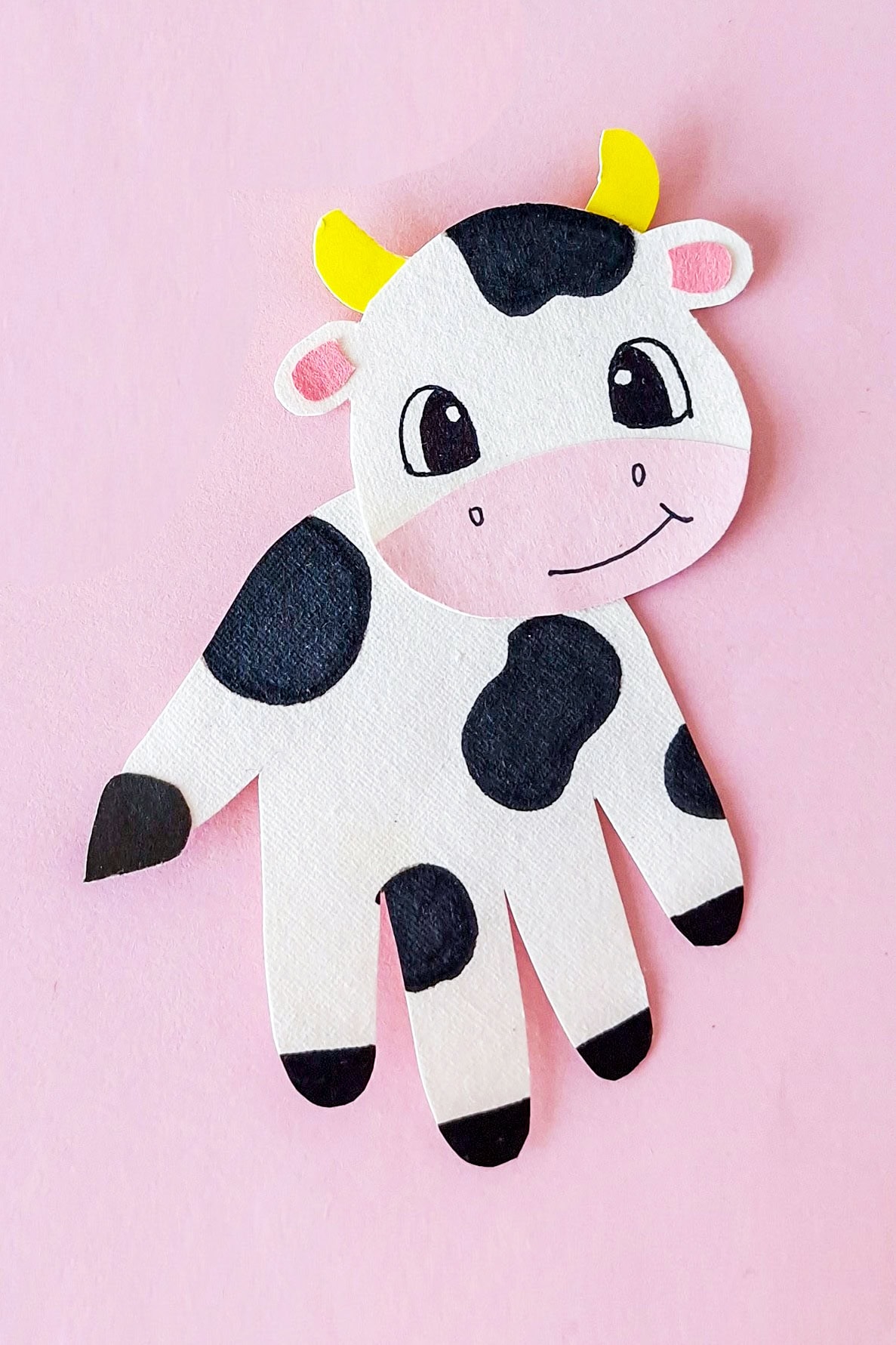 Handprint cow craft.