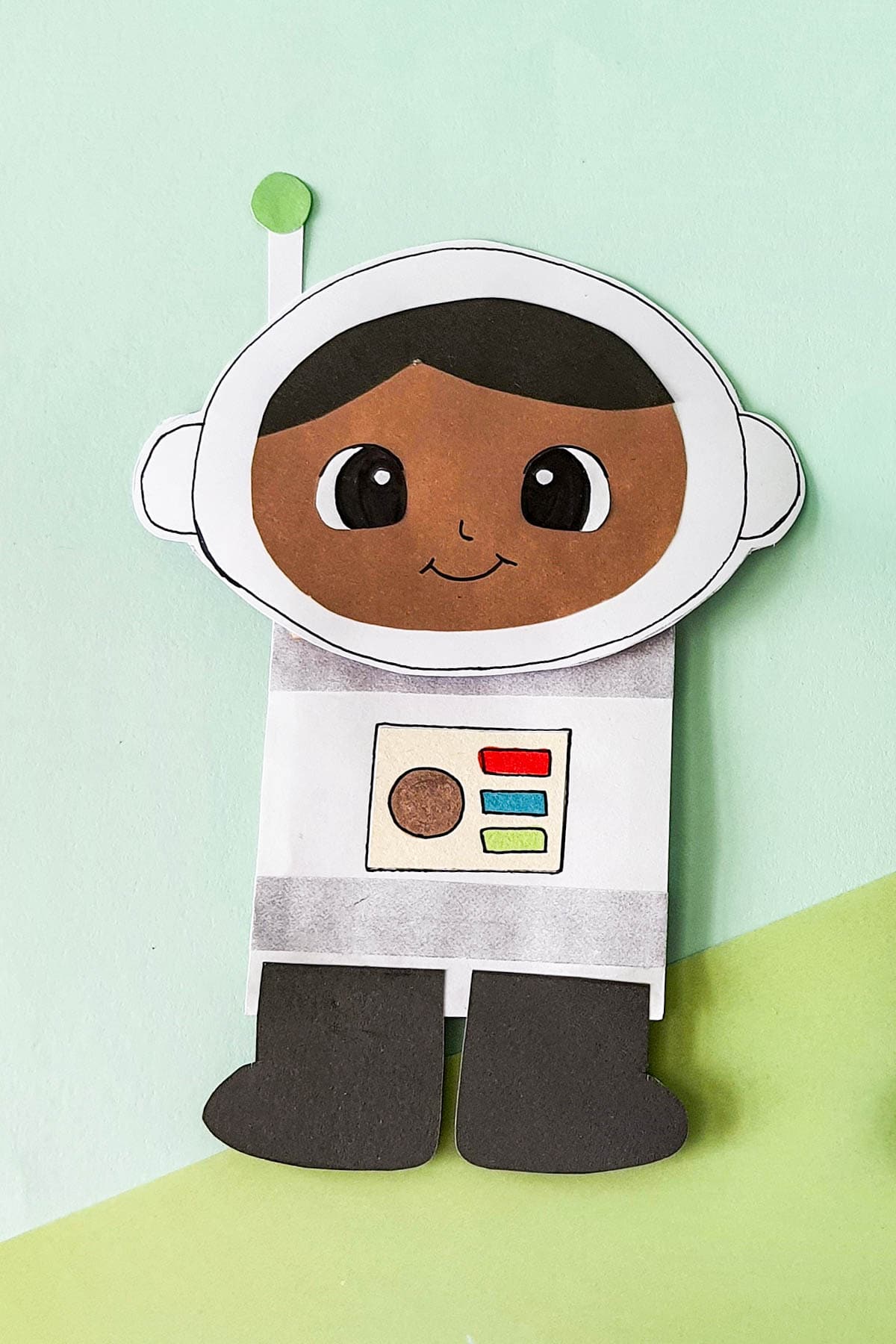 Paper bag astronaut craft puppet.
