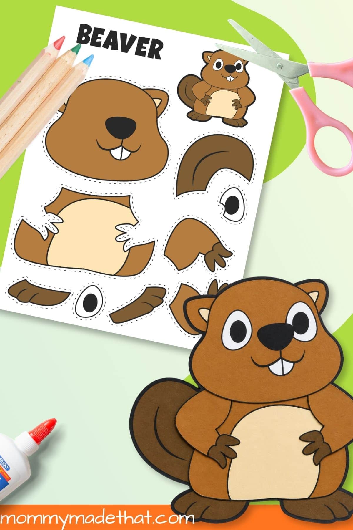 Assembled beaver printable craft beside scissors and template
