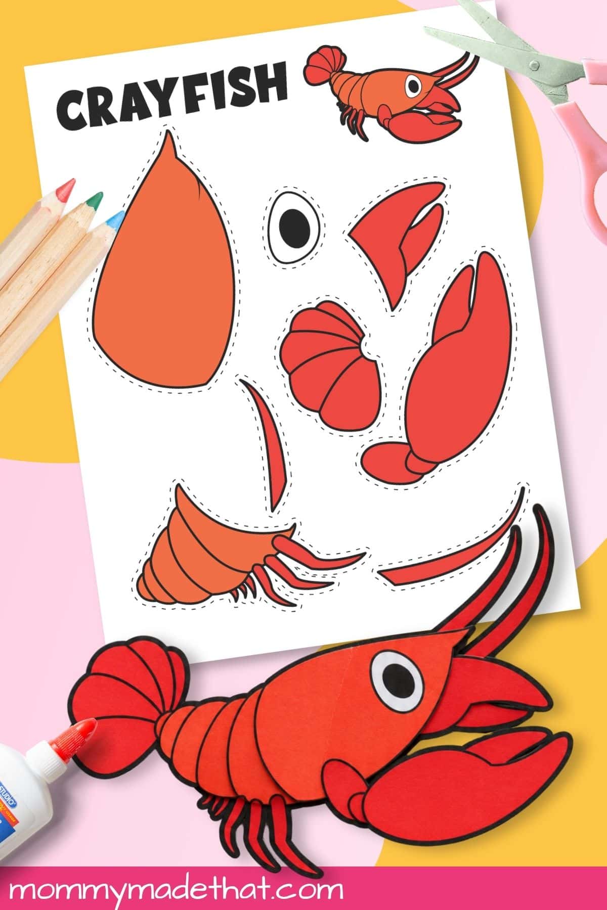 Assembled crayfish printable craft beside scissors and template