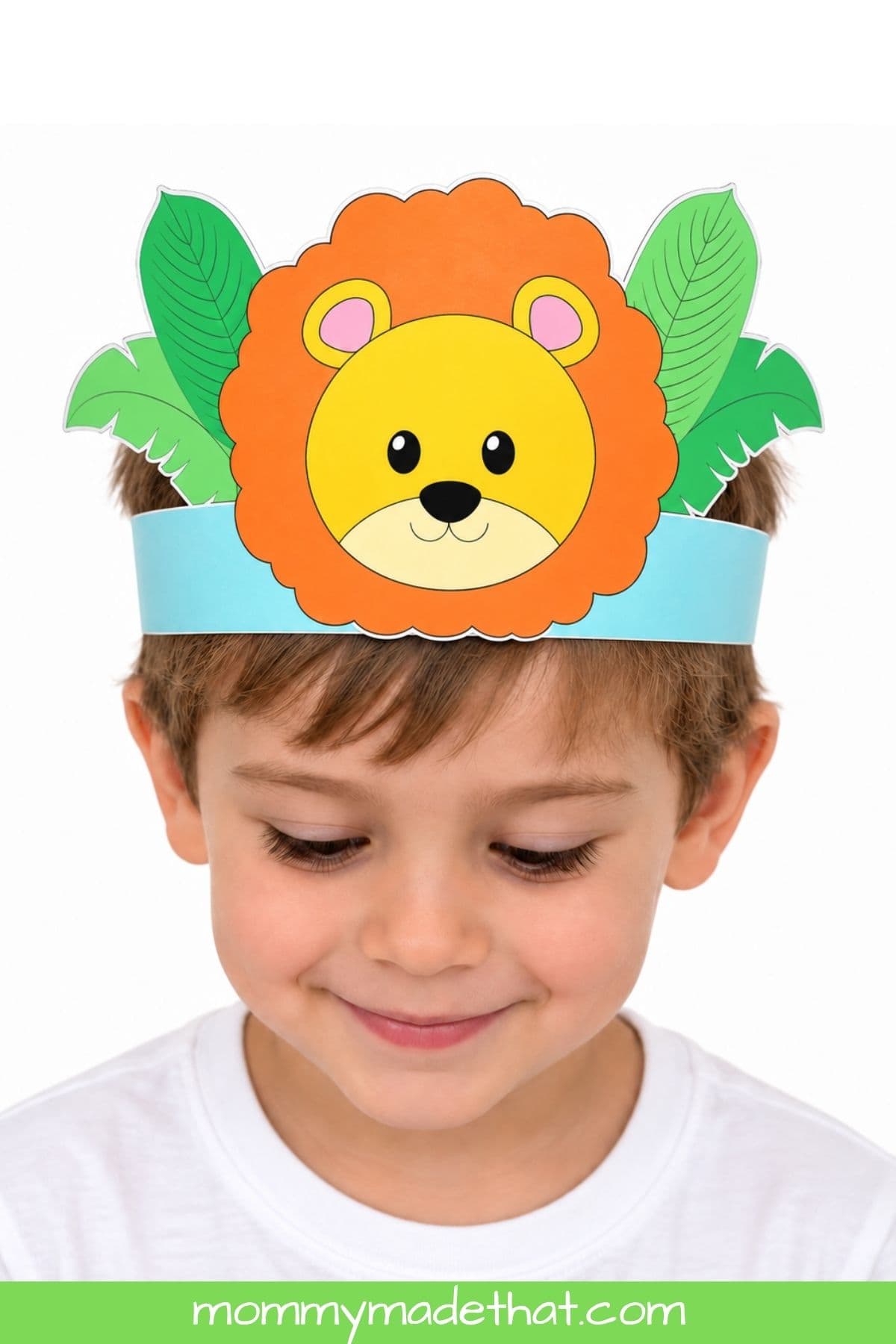 Child wearing a colorful printable lion crown with an orange mane and green leaves