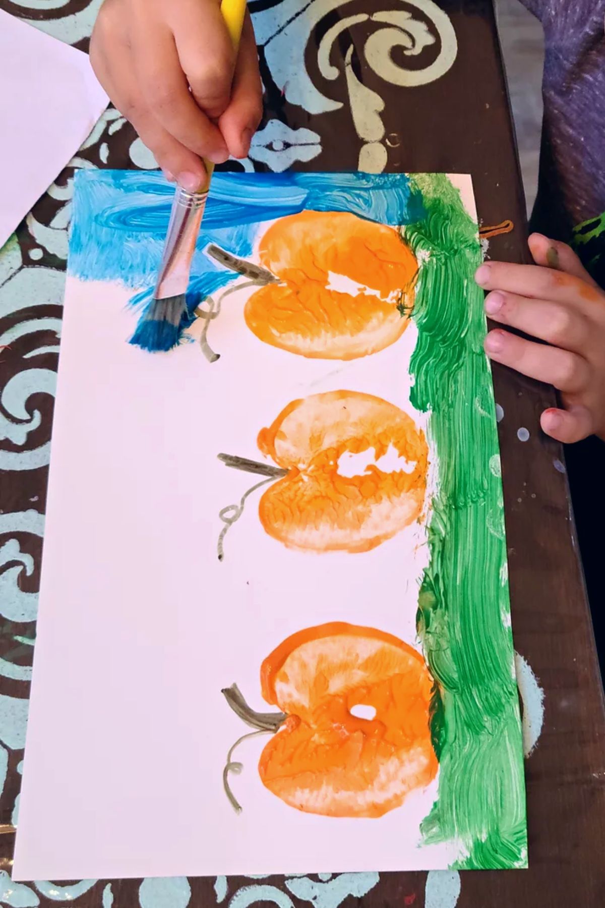 apple painting pumpkin activity