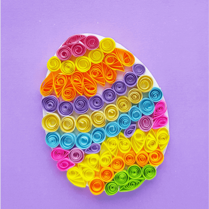 Quilled Easter egg craft. Fun paper easter egg craft you can do by yourself or with your kids! Made of colorful strips of paper.