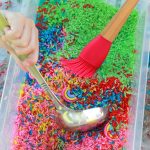 rainbow rice dyed with food coloring for sensory bin