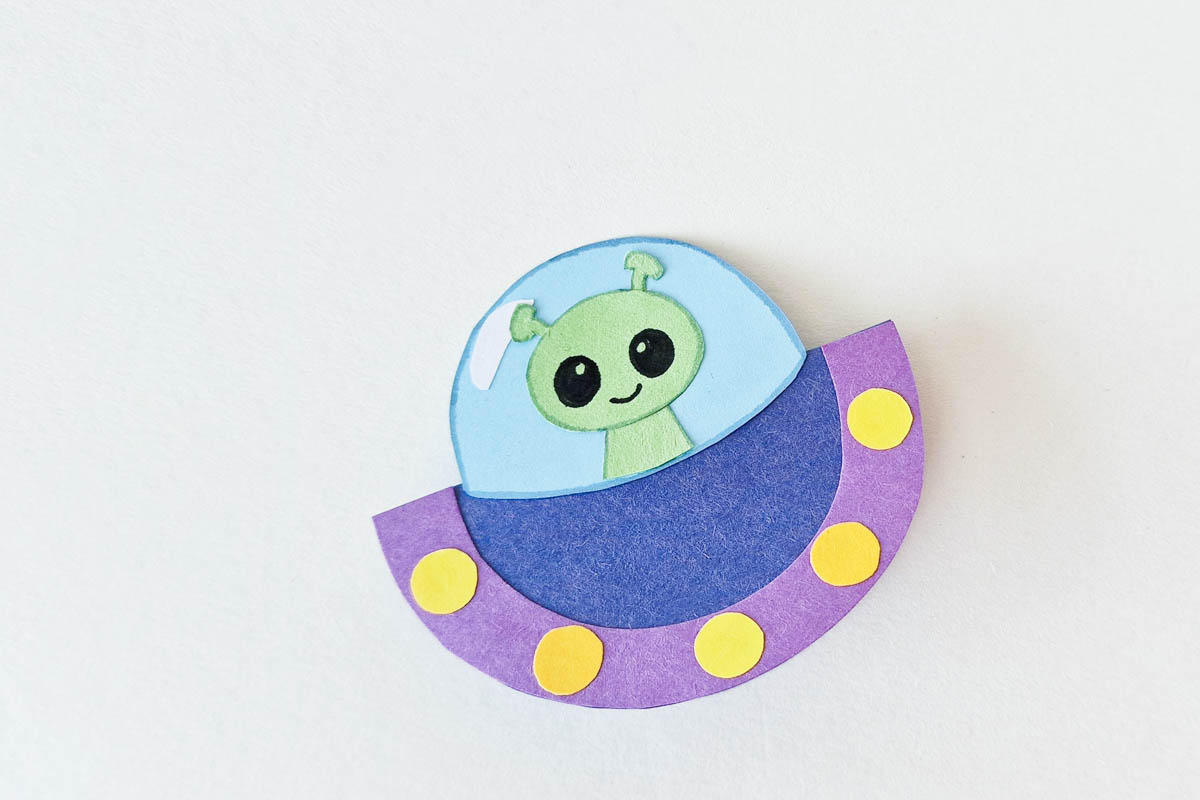 Attaching alien to UFO.