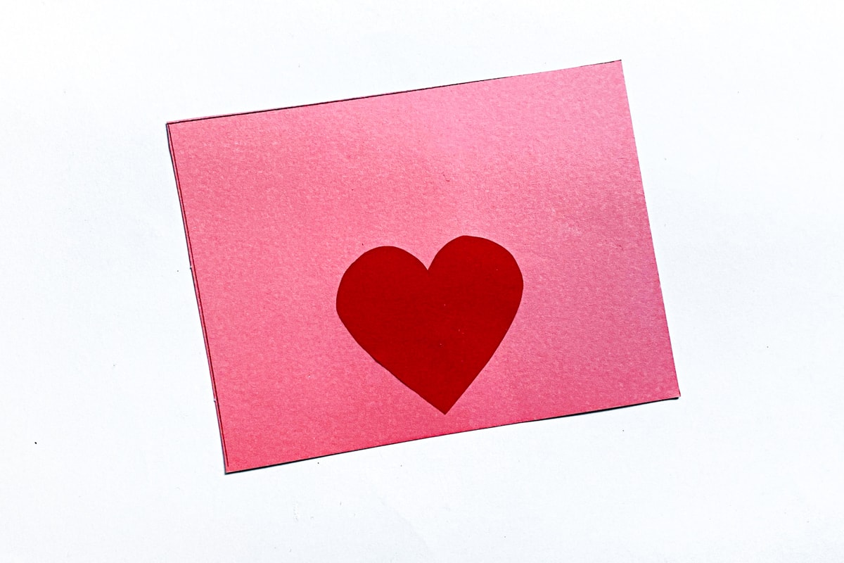 pink rectangle with red heart in center bottom
