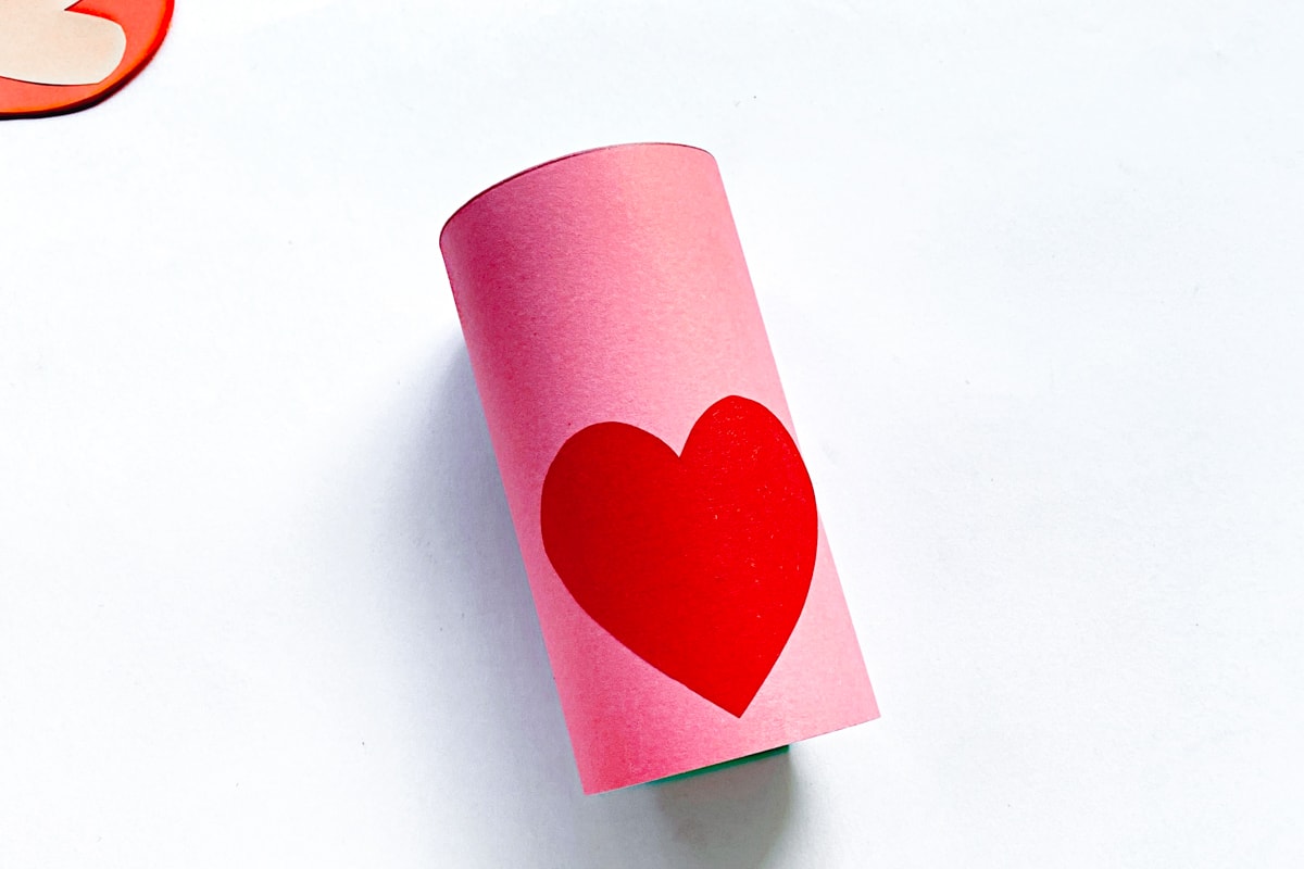 toilet paper roll wrapped with pink paper 