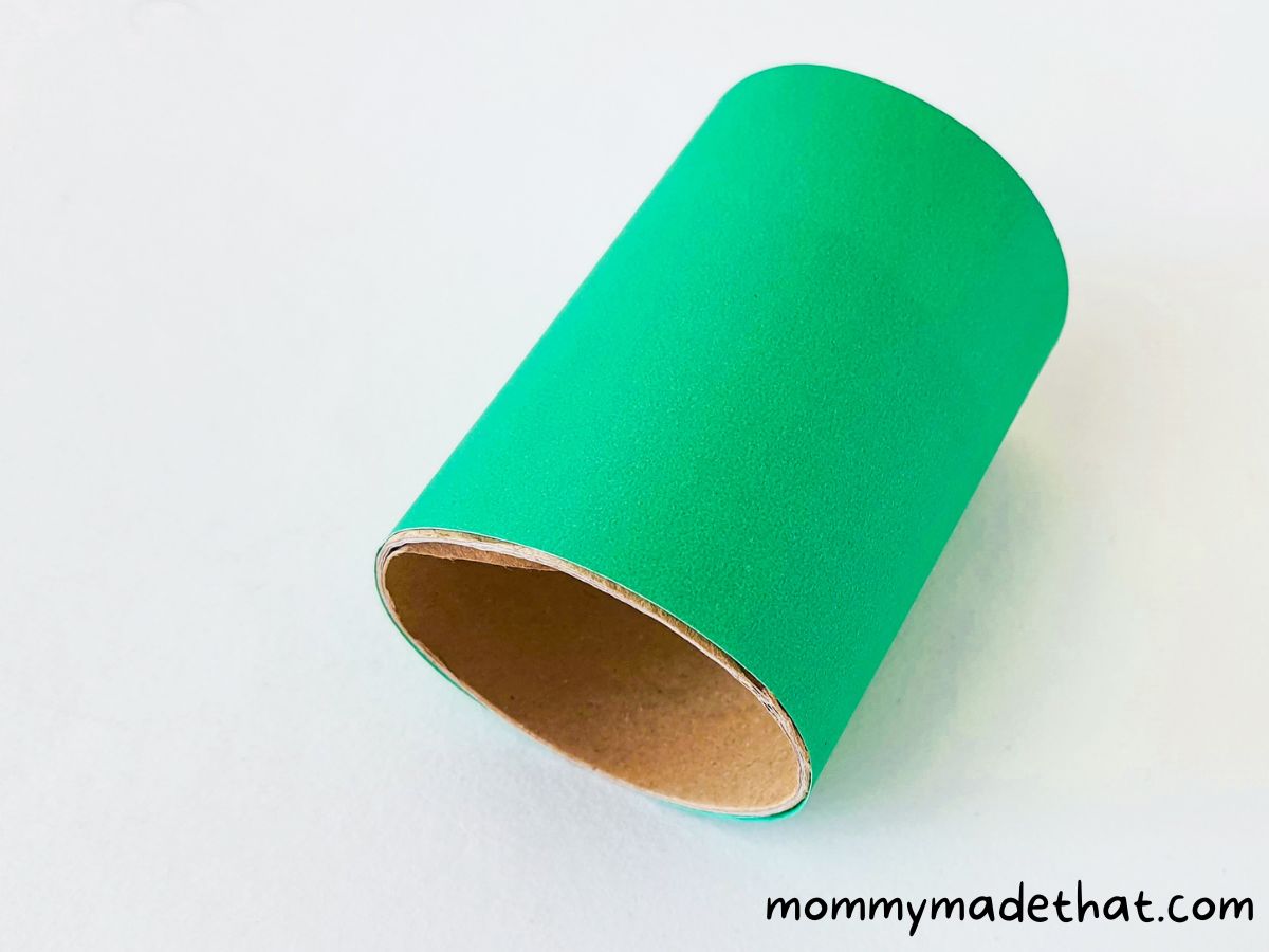 toilet paper roll covered in green paper