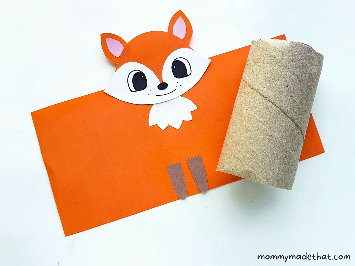 paper fox about to wrap around toilet paper roll
