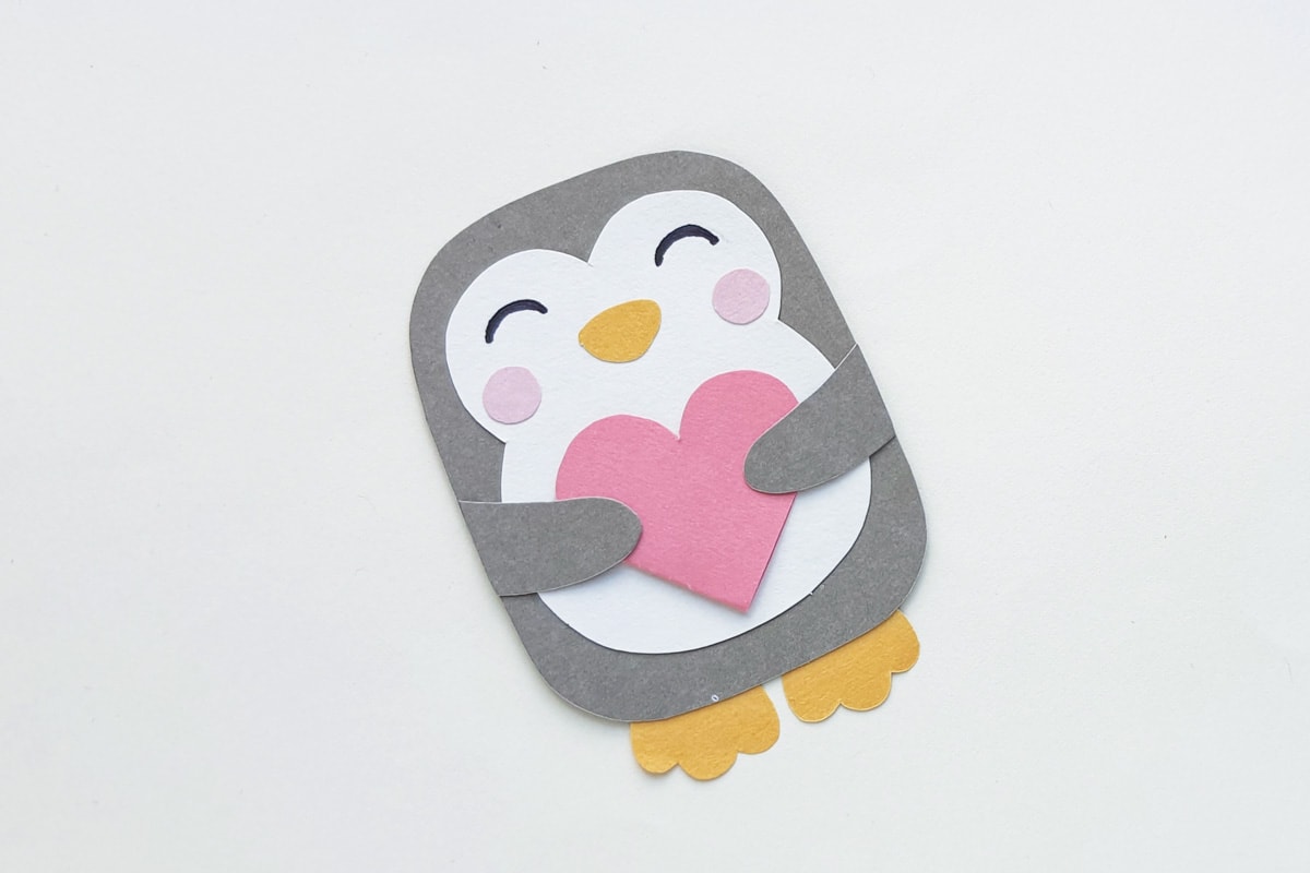 penguin valentine craft holding heart